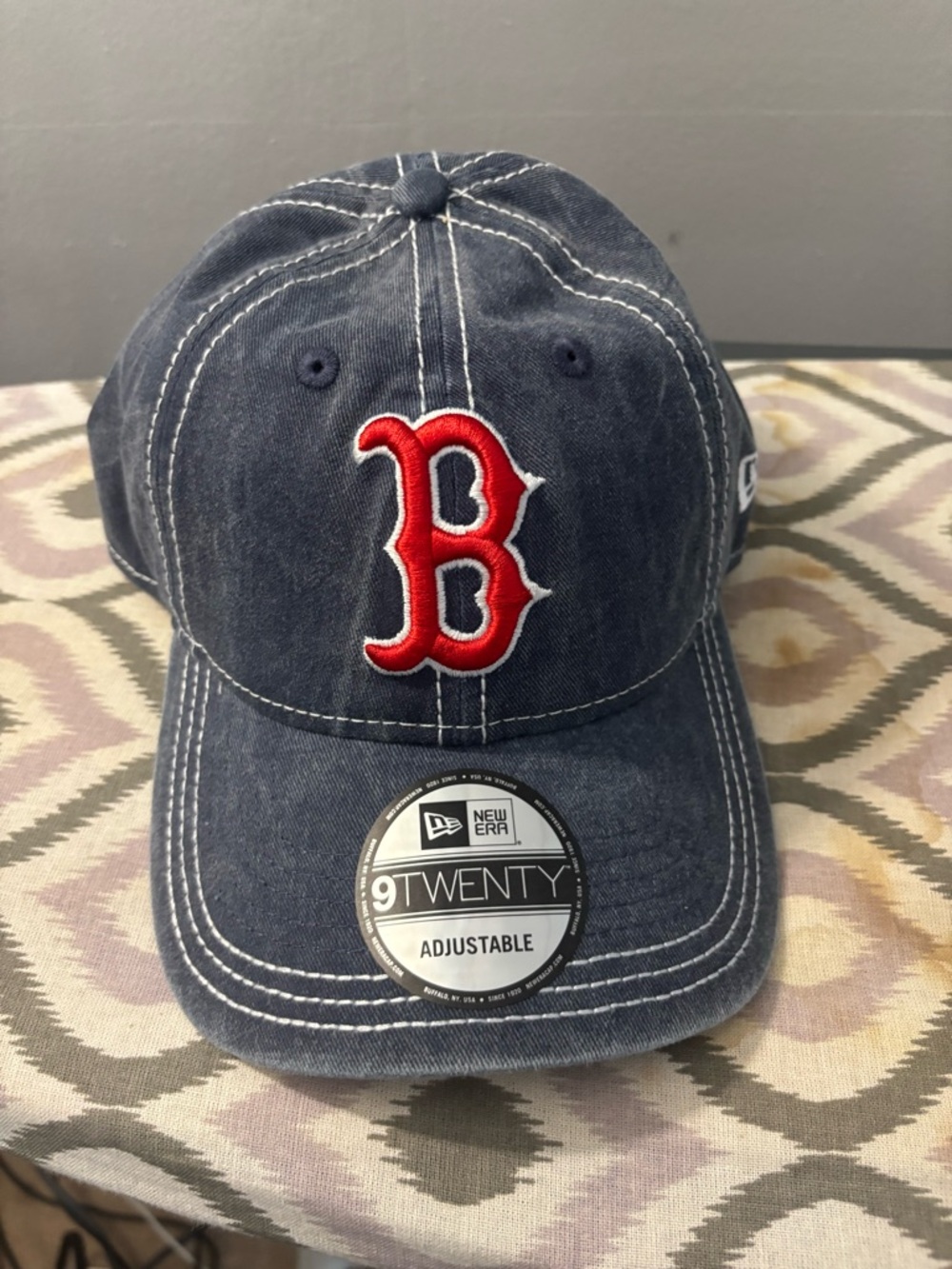 New Era navy denim cap with red 'B' logo